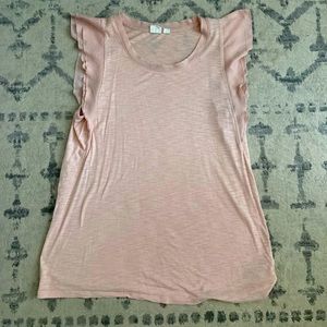 Pink blouse perfect for warm weather and layering with flutter sleeves.